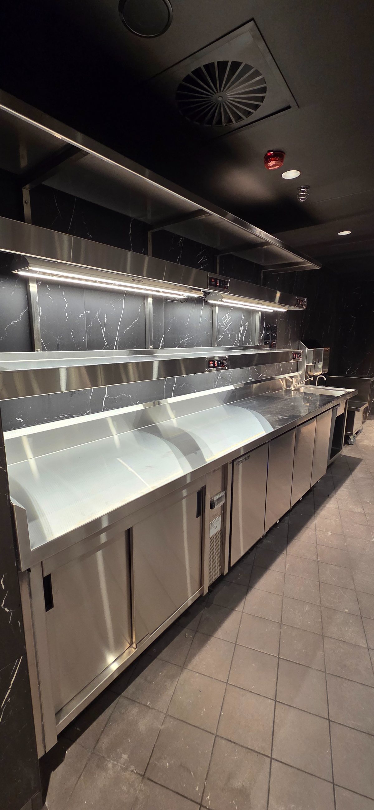Marble and stainless servery pass